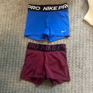 Maroon and blue Nike pros